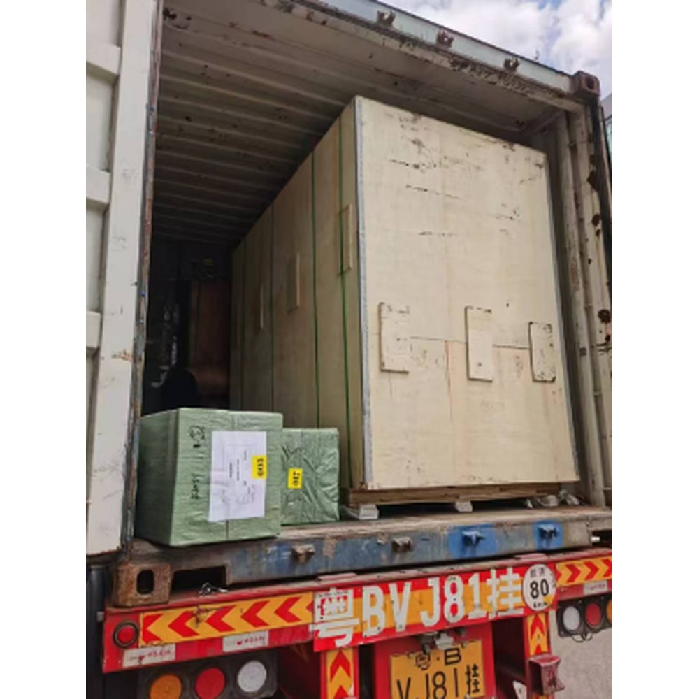 Large cargo positioned and secured inside a container